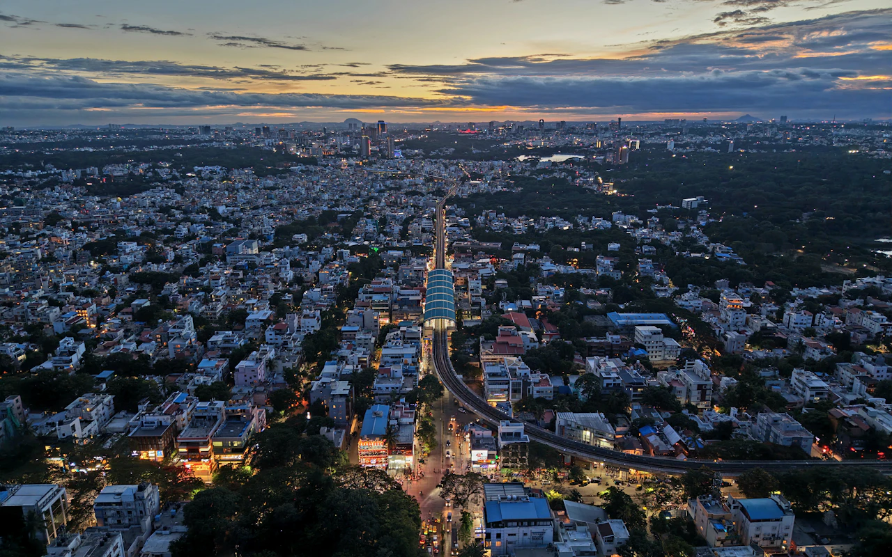Bengaluru streets and buildings at dusk.